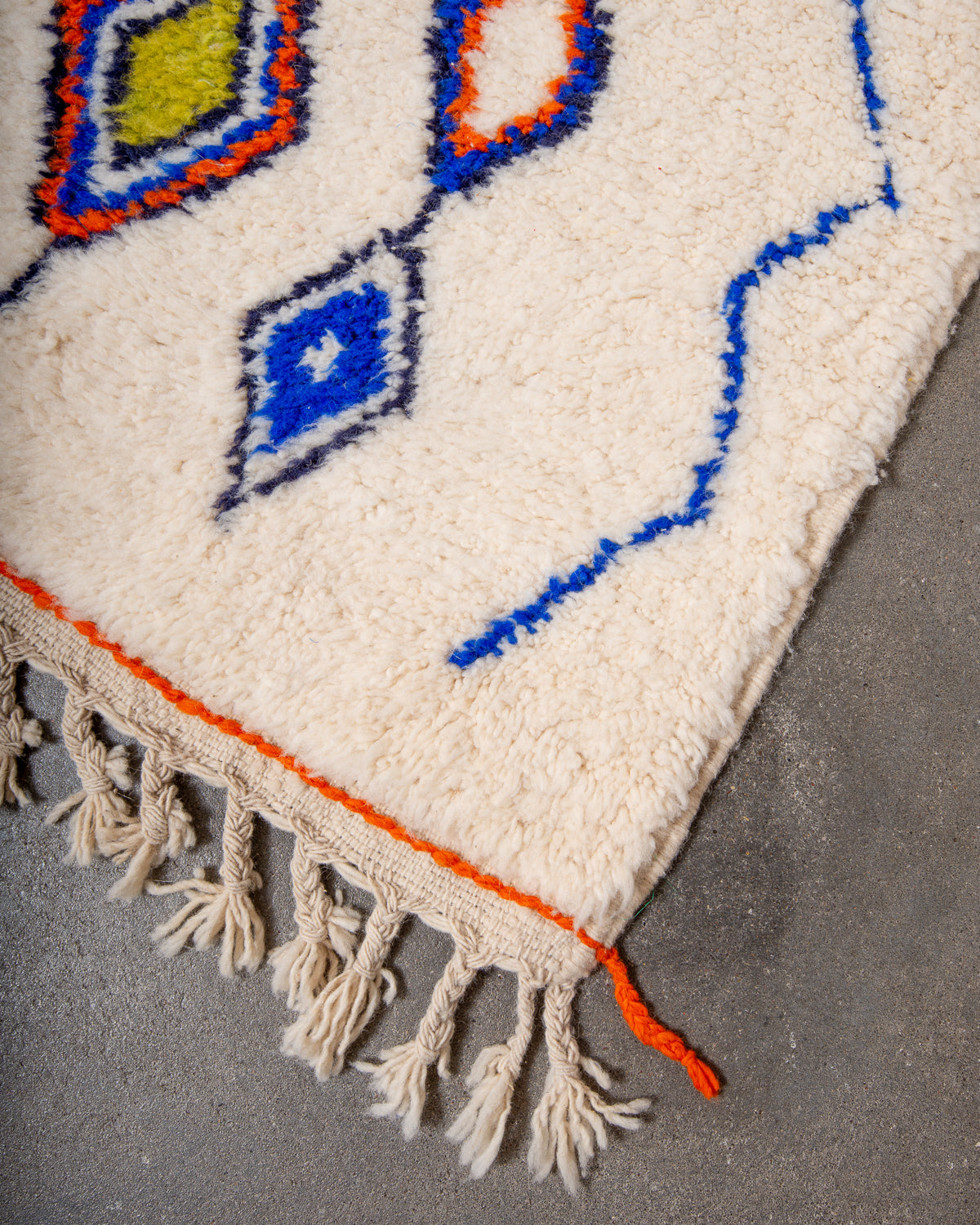 Modern, designer, handcrafted Berber rug from Morocco. Beniourain carpet with beautiful colours and patterns and fluffy wool texture.